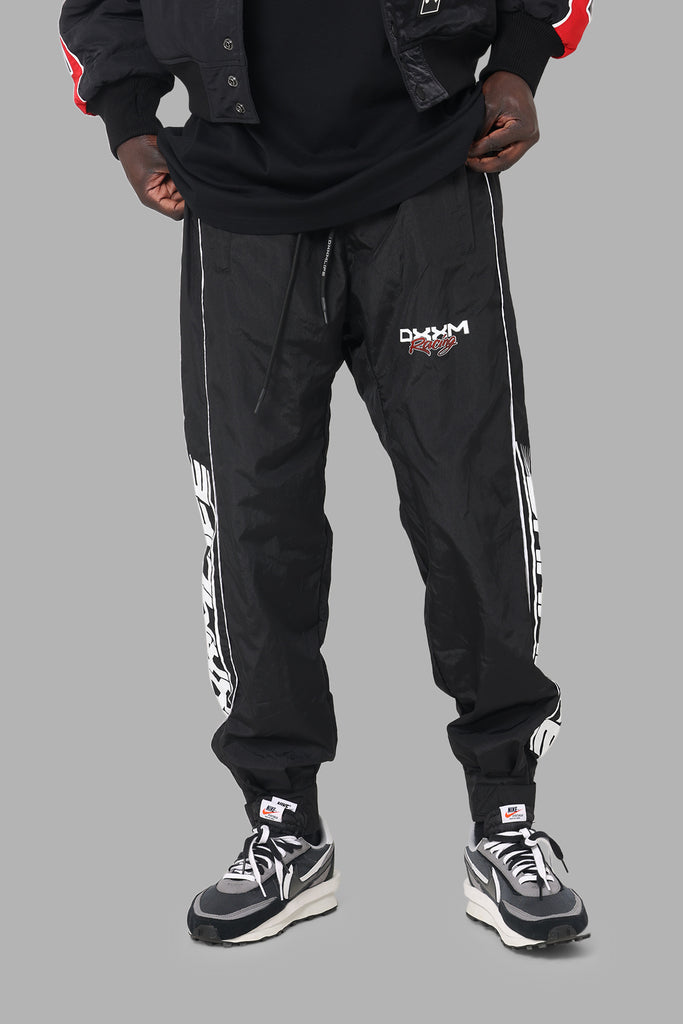 DXXMLife L-5 Nylxn Racing Trackpants Black | Culture Kings US